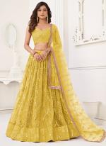 Butterfly Net Yellow Party Wear Embroidery Work Lehenga Choli